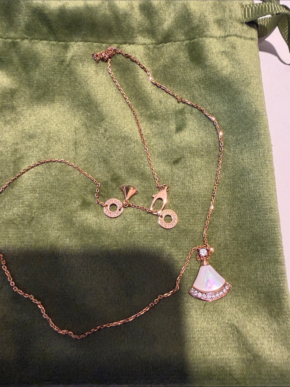 Gold Pearl Pendant Necklace on Green Velvet Pouch